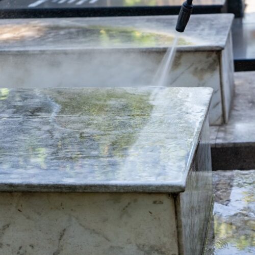 Headstone cleaning using a pressure washer