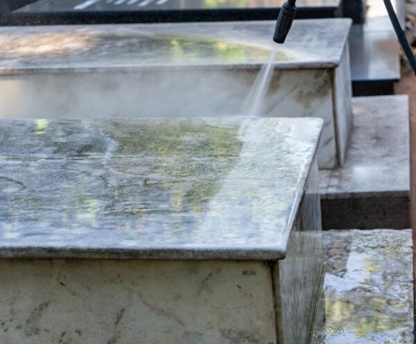 Headstone cleaning using a pressure washer